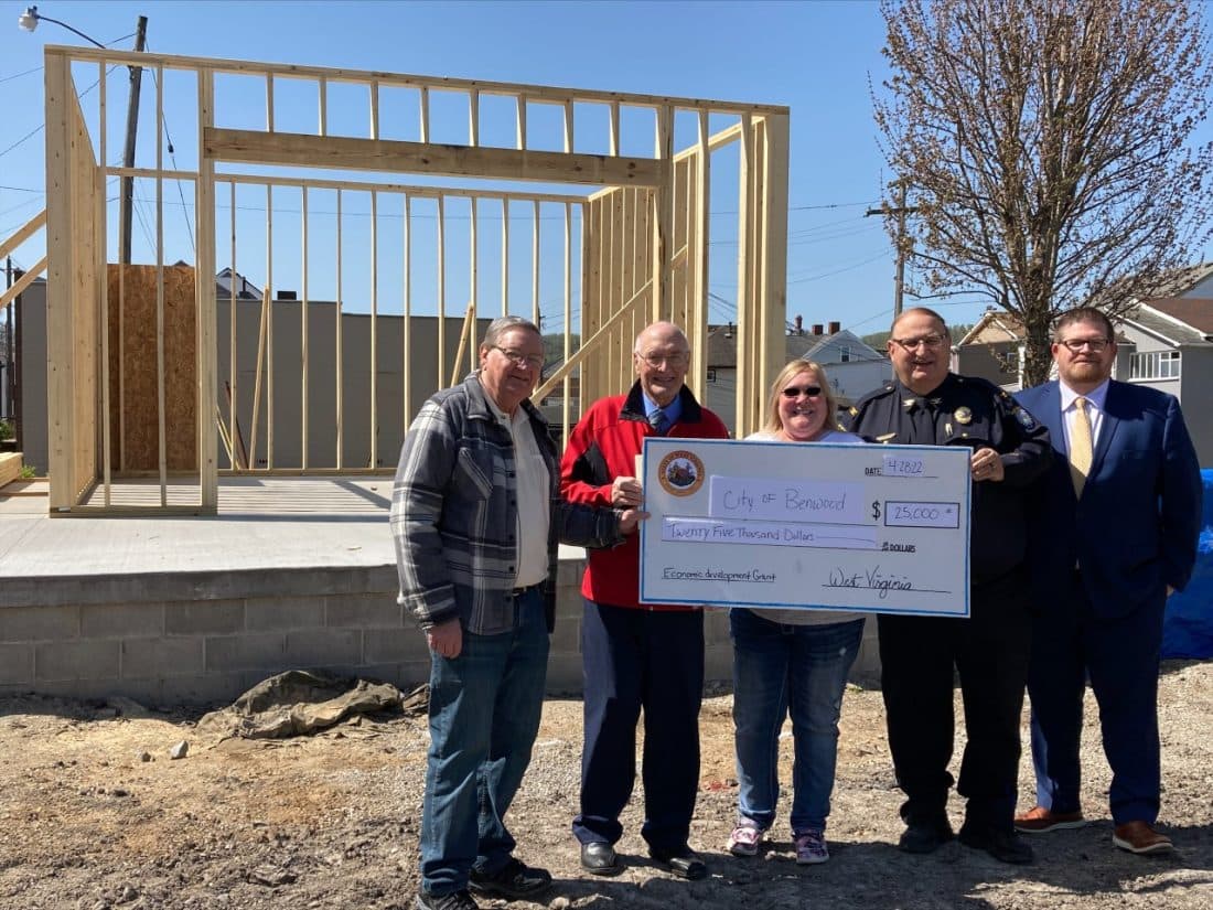 Senator Charles Clements presents a check to Benwood WV city officials on behalf of the State of West Virginia for their local amphitheater project.